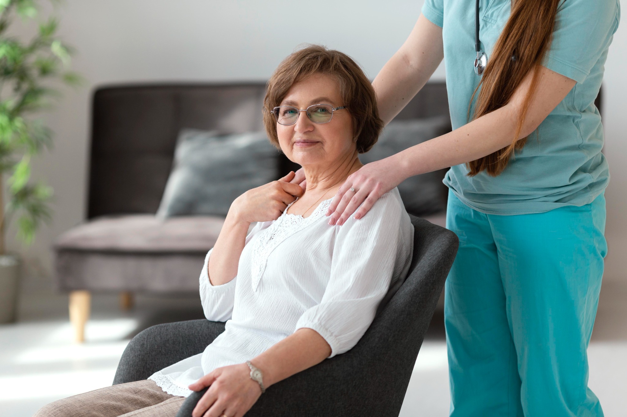 A senior resident receiving warm, professional care